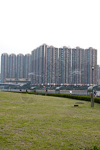香港公共住房公寓区一楼住宅蓝色铁路房子财产居住城市建筑家庭天空图片