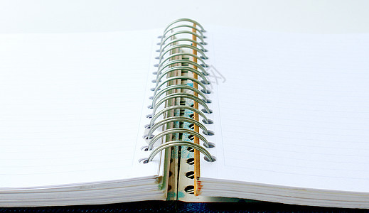 笔记本电脑戒指营销教育学习文档螺旋日记办公室白色教科书图片