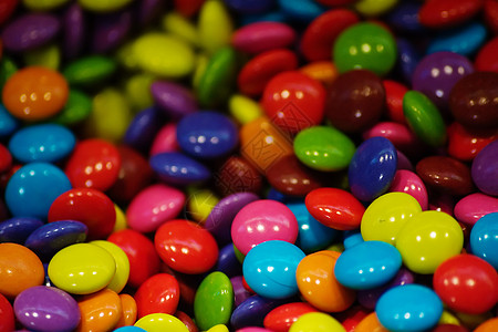 多彩糖果巧克力阴影色调食物小吃甜点背景图片
