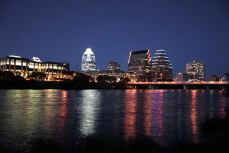 夜间德克萨斯州市下城奥斯汀辉光技术建筑物城市首都景观商业生活场景高楼图片