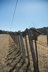 得克萨斯山丘国家田园栅栏天空场地乡村靴子丘陵旅行滚动草地图片