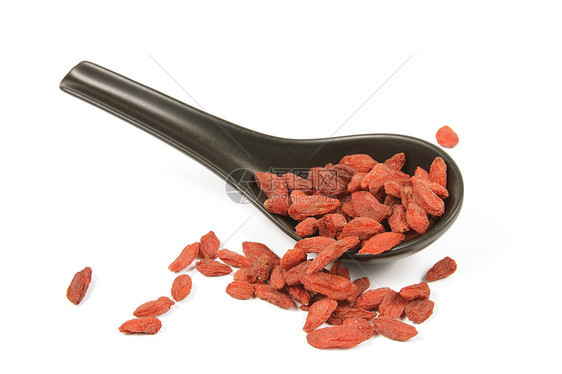 黑勺子上的果芝白葡萄酒保健浆果草本枸杞小吃食物草本植物水果红色药品图片