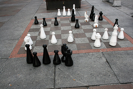 街头象棋闲暇娱乐游戏棋子正方形木头黑色街道典当战略图片