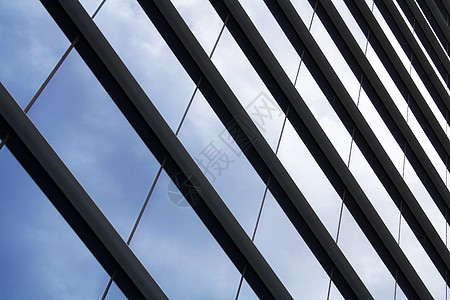 玻璃面罩财产蓝色窗户镜子反思建筑控制板面板建造背景图片