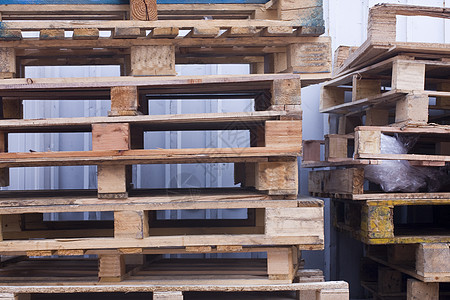 托盘店铺架子工厂木板库存回收仓库商业运输木材图片