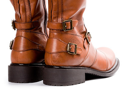 一双棕色靴子配饰材料皮革衣服旅行橡皮远足宏观白色图片