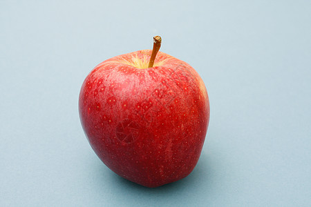 红苹果红色食物水果蓝色图片