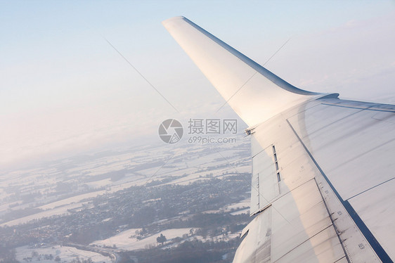 起飞齿轮奢华飞机场旅游太阳蓝色农村飞行员航班勘探图片