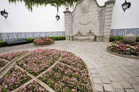 西风格花园旅行天空房子太阳假期跑步蓝色公园植物建筑图片