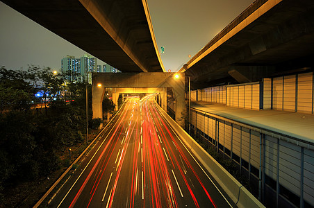 夜间在高速公路上市中心立交桥场景速度路灯景观旅行生活运输赛车图片