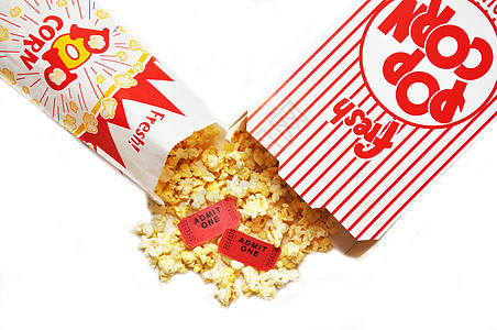 爆米花和电影票小吃剧院黄油盒子食物入口门票电影黄色展示图片