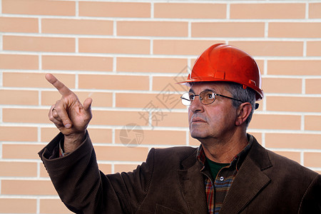 建筑师按钮安全检查员钥匙设计师领班男人头盔工人承包商图片