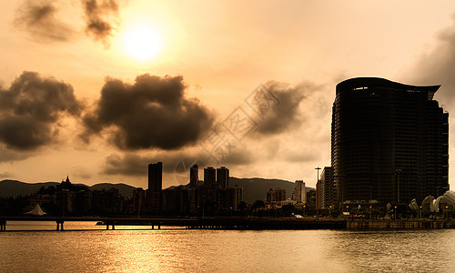 城市轮廓橙子市中心建筑学房子天堂天空太阳首都景观天际图片