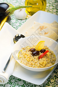 巴丁巴巴加努什柠檬拼盘餐巾美食茄子起动机桌子蔬菜食物面包图片