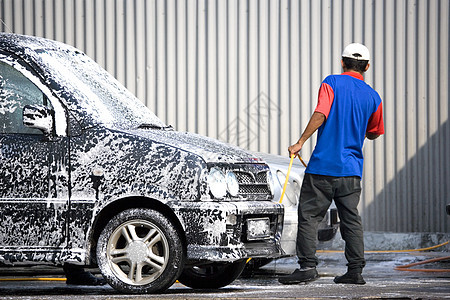 洗车车辆工人汽车软管摩托车就业车轮喷涂真空抛光图片