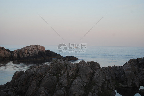 日落橙子悬崖天空波浪天气水平砂石天堂旅游旅行图片