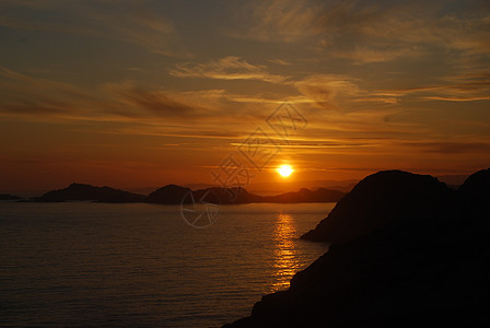 日落太阳天气反射砂石流动红色天堂橙子天空旅游图片