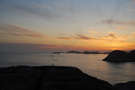 日落天堂旅游天空反射橙子悬崖石头流动椴树天气图片