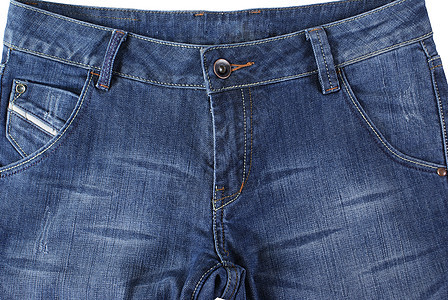牛仔裤裤子苍蝇口袋按钮棉布女性材料背景图片