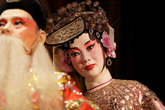 州歌剧木偶翅膀剧院女士展示化妆品蓝色文化窗帘传统娱乐图片