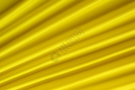黄色背景条纹材料纺织品柔软度丝绸太阳背景图片
