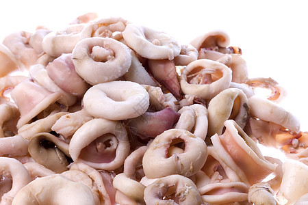 孤立的新鲜鱿鱼环海鲜宏观烹饪营养海洋食物乌贼章鱼戒指美食图片