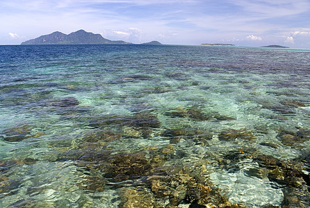 热带岛屿和开海天堂天空海岸海浪天气蓝色地平线珊瑚假期风景图片