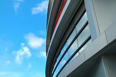 商业建筑的外部外贸易办公室市中心镜子城市天空公司建筑学金融窗户背景图片