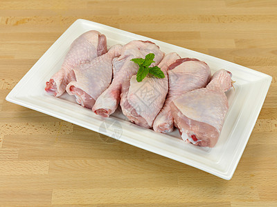 鸡粉棒粉色盘子营养厨房鸡腿食物白色宏观家禽皮肤图片