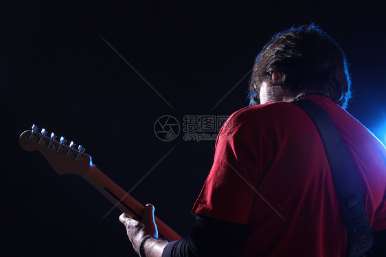 吉他播放器在舞台上夜店音乐岩石红色吉他演员艺术家流行音乐男人男性图片