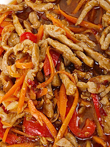 中国炸猪肉 胡椒和胡萝卜蔬菜盘子午餐美食油炸餐厅食物红色图片