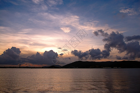 日落半岛天空全景海洋风景反射支撑珍珠海浪图片