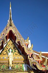 泰国佛教寺庙佛陀反射信仰上帝建筑雕刻神社连体金子佛教徒图片