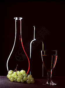 葡萄酒剪影红色白色背景黑色金子液体派对酒精庆典图片