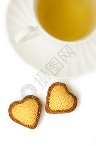 绿茶和心形饼干小吃绿色白色杯子黄油可可早餐食物图片