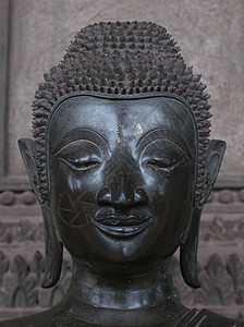 老挝万象的佛像山楂树雕塑宗教文化雕像沉思艺术哲学背景图片
