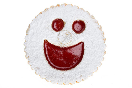 在白色背地上被孤立的微笑曲奇饼蛋糕饼干食物糖霜小吃糕点微笑糖果眼睛笑脸图片