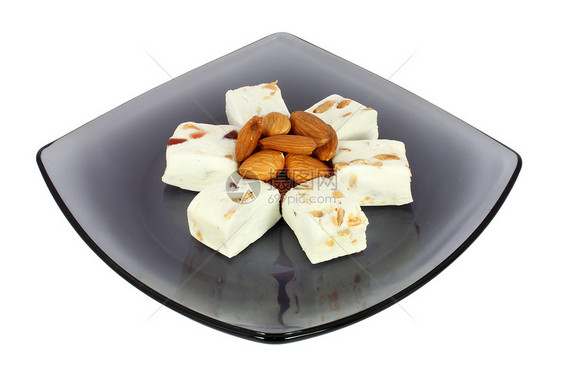 美味的诺加花生甜点小吃白色水果盘子坚果玉米糖果玻璃图片
