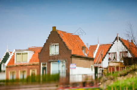 荷兰国别区小屋反射国家乡村建筑房子天空旅游蓝色风景图片