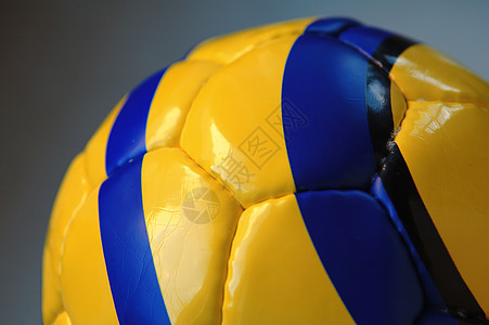 足球球蓝色曲线闲暇活动运动游戏黄色圆形皮革竞赛图片