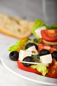 燕麦面包特写希腊沙拉小吃黄瓜面包菜单蔬菜洋葱盘子起动机胡椒背景