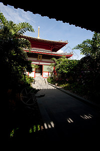 佛教寺庙雕像花园文化建筑学宝塔精神金子红色神社阴影图片