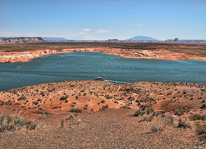 亚利桑那州鲍威尔湖瞄准具蓝色橙子沙漠木板悬崖岩石天空海浪公园图片