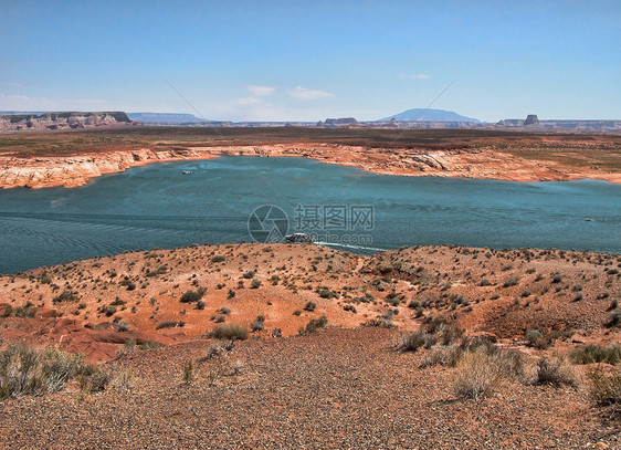 亚利桑那州鲍威尔湖瞄准具蓝色橙子沙漠木板悬崖岩石天空海浪公园图片