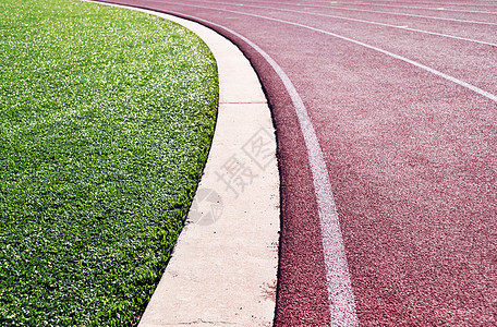 轨道和字段竞技飞跃挑战胜利竞赛体育场跑步团队车道速度图片