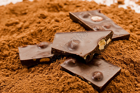 可可和棕色糖果甜心粉末可可坚果巧克力甜点背景图片