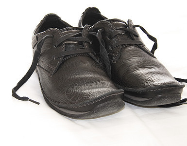 深色皮鞋配饰棕色白色鞋带鞋类男士女性黑色衣服时尚图片