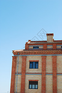 住宅砖建楼蓝色砖墙天空房子阳台橙子民众红色建筑学图片
