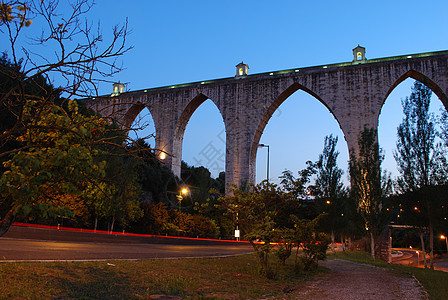 Lisbon自由水下水道汽车动议风格历史性建筑树木渡槽纪念碑拱门历史运动地标图片