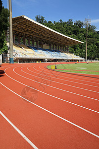 运动场重量女性赛跑者闲暇火车场地跑步成人游戏日落背景图片